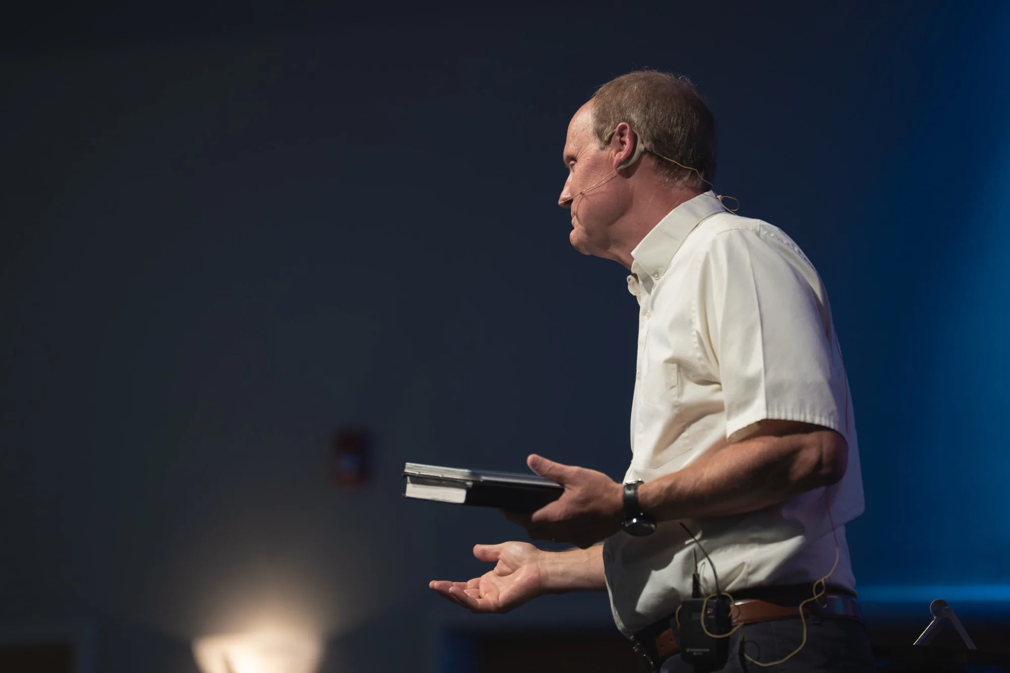 The pastor preaching during a Sunday service